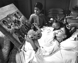 Frida painting while recovering from surgery.