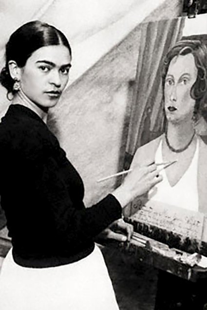 Frida Kahlo painting as a young woman.