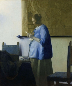 A painting by Johannes Vermeer, Woman reading Woman reading a letter, circa 1662-1663.
