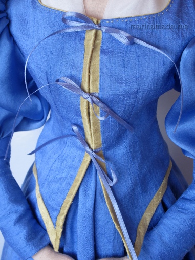 Vermeer muse Dress detail, handmade by Marina Elphick. Marina creates soft sculpted muses of the women in popular artists' lives and gives us an alternative narrative to their story. Marina's muses aim to educate and inform, appealing aesthetically to art lovers and students.