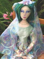 Bella muse, a soft sculpted figurine.